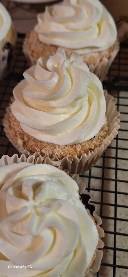 Blueberry Jumbo Muffins with a Lemon Buttercream Filling and Topping.